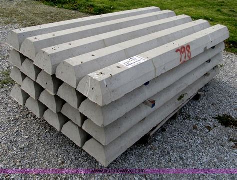 (20) concrete parking stops in Troy, MO | Item B2696 sold | Purple Wave