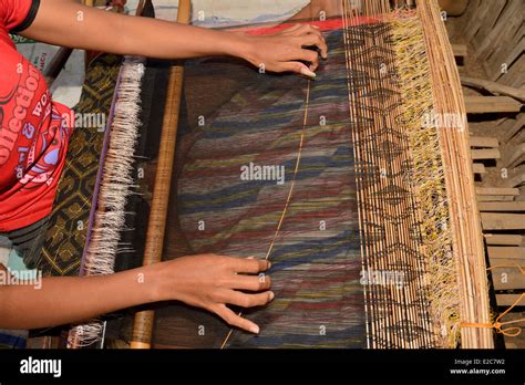 Indonesia, Sumbawa, Sumbawa Besar surroundings, songket or ikat weaving in the village of ...