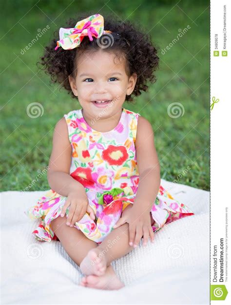 Hispanic Girl With An Afro Hairstyle - Download From Over 26 Million High Quality Stock Photos ...