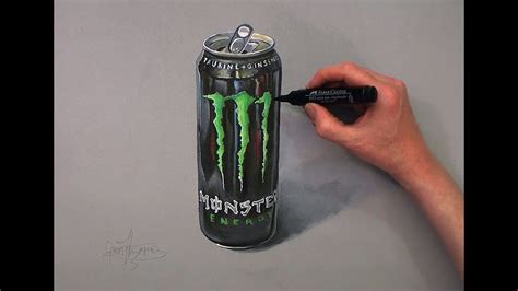 a drawing of a can of monster energy with a hand holding a marker next to it