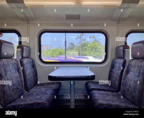 BURBANK, CA, JUN 2020: side view, interior of empty Metrolink train car, light rail system used ...