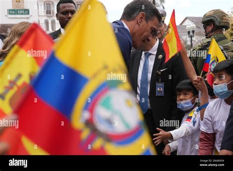 Spain's Prime Minister Pedro Sanchez greets children as he walks ...