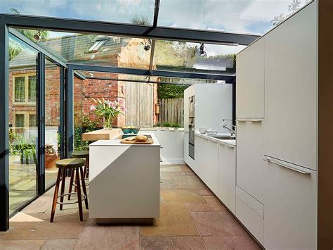 Dreamy 18th-Century English Cottage Acquires an Inspired Glass Box Kitchen