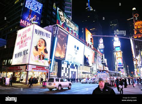 Times Square at night street view with busy traffic in Manhattan, New ...