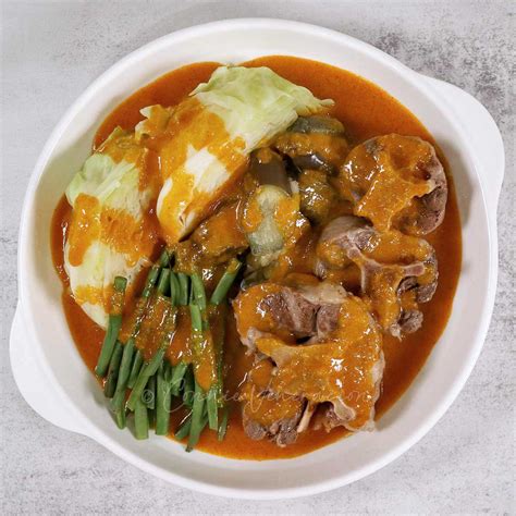 Kare-kare (oxtail and vegetables in peanut sauce)