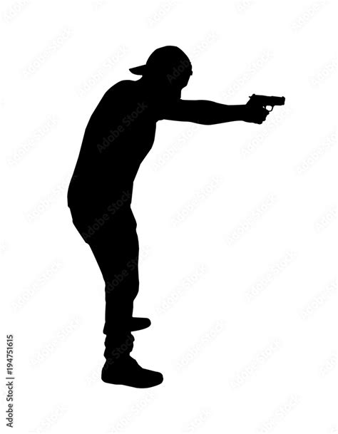 silhouette man holding handgun in a shooting positionsilhouette man ...