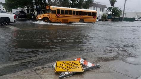 Hurricane center tracks 2 systems as South Florida gets floods, high winds