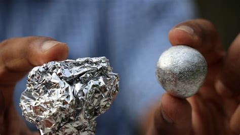 Give Your Dishes A Good Scrub Using A Ball Of Aluminum Foil