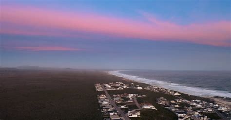 Drone Footage of Houses Under a Pink Sky Free Stock Video Footage ...