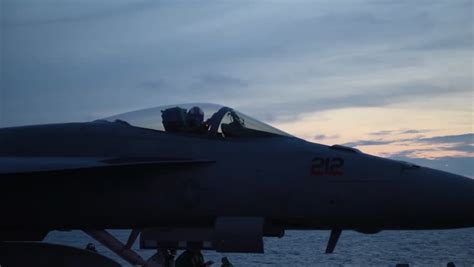 Aircraft Marshaller Signals Super Hornet Aircraft | Editorial Video | 13240611a | Shutterstock