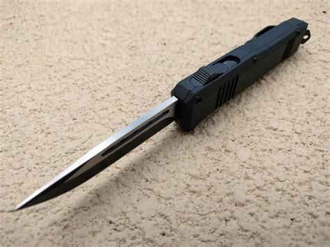 Out-The-Front Automatic Knife 7" Black Drop Point Blade OTF