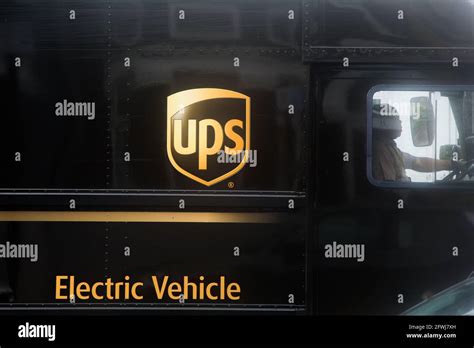 The driver of the UPS van prepares to drive in London Stock Photo - Alamy