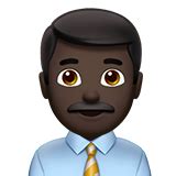 👨🏿‍💼 Man Office Worker: Dark Skin Tone Emoji on Apple iOS 15.4