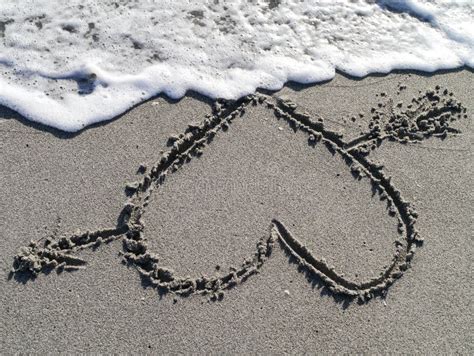 Heart in Sand Beach stock image. Image of nature, married - 24475703