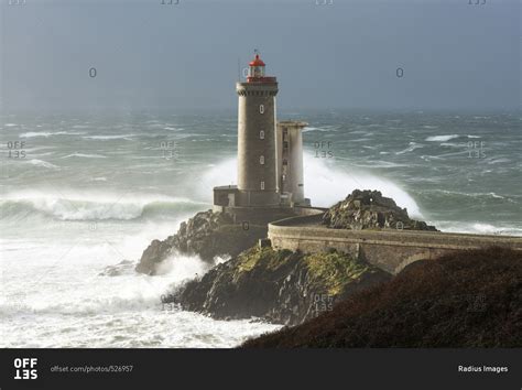 Phare Petit Minou lighthouse during a storm, Finistere, Bretagne stock photo - OFFSET