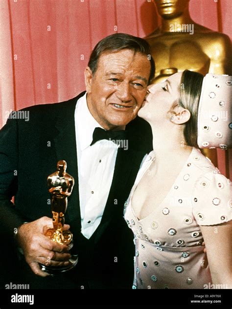 John Wayne Accepts His Best Actor Oscar For True Grit From Barbra ...