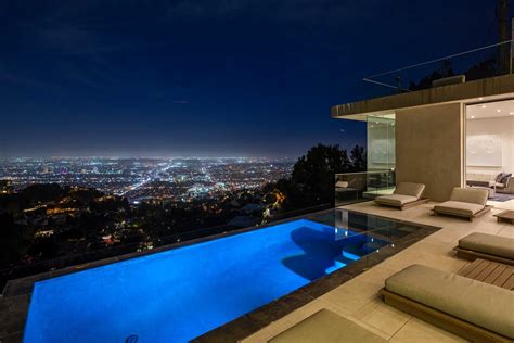 Home in Hollywood Hills with breathtaking views | Hollywood hills homes, Hollywood hills, Mansions