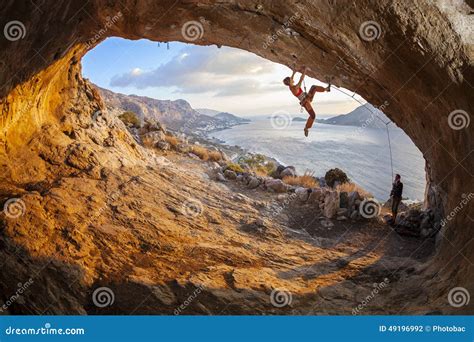 Man Lead Climbing On Cliff, Belayer Watching Hi Stock Photo ...