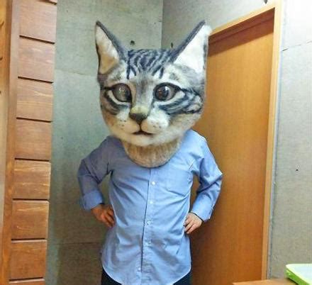 I Need One Of These Giant Super-Realistic Cat Head Masks In My Life