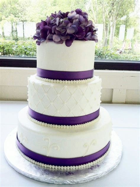 Elegant white and purple cake with flowers and ribbon to boot | Purple wedding cakes, Round ...