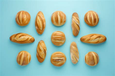 Some Loaves Bread on Blue Background on the Table Top View Stock Photo ...