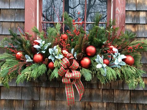 Holiday window box with fresh greens, berries and shiny red balls | Christmas window boxes ...