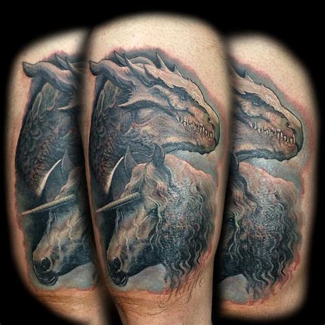 Realistic, full color dragon with unicorn thigh piece by Haylo : Tattoos