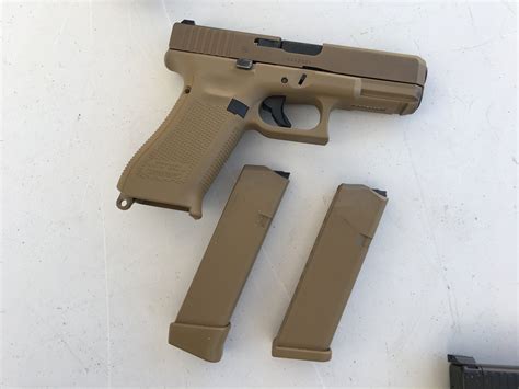 Glock 19X (G19X), Glock 19 (G19) Gen5, Glock 17 (G17) Gen5, and Glock 34 (G34) Gen5 at the Range ...