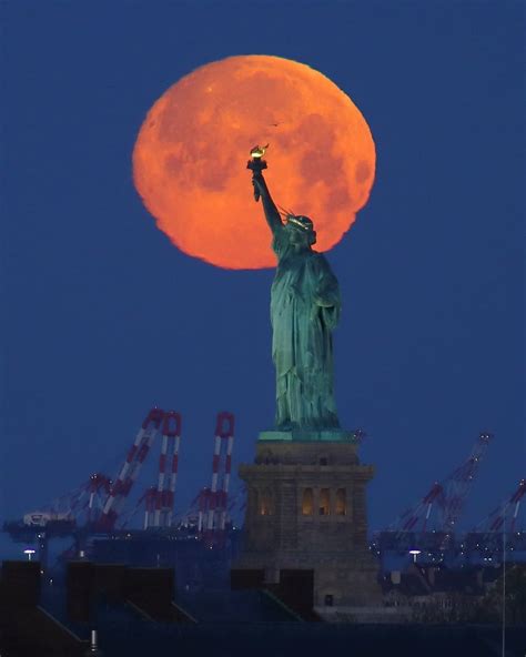 RTÉ News on Instagram: “An almost full moon behind the Statue of ...