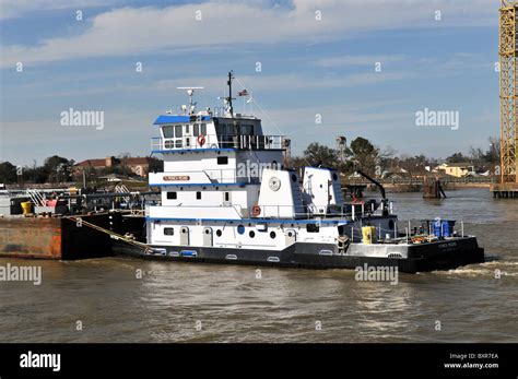 Tugboat pushing barge, Mississippi River, New Orleans, Louisiana Stock Photo - Alamy