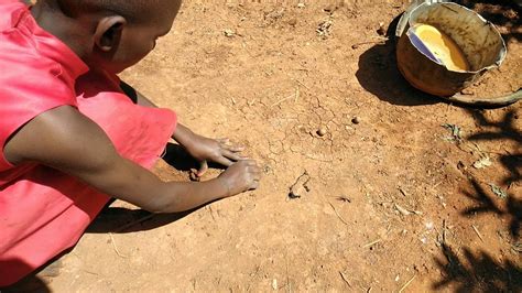 Kenya village life/village children playing mbano game - YouTube