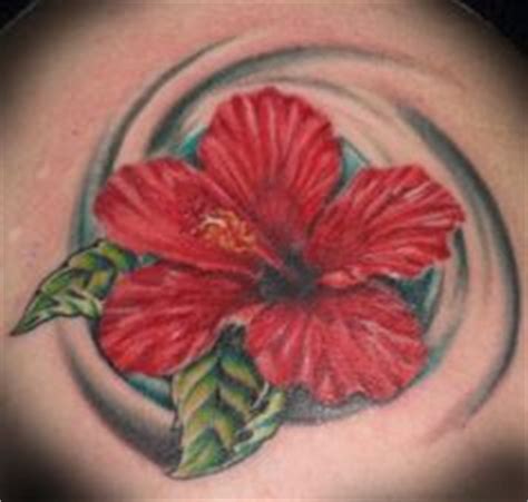 Getting ideas for my 4th tattoo. Love the hibiscus and swirls of water ...