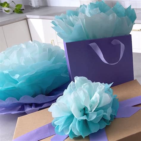 3 Impressive (But Easy) Tissue Paper Gift Wrap Tricks | Hallmark Ideas ...