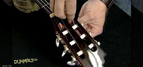 How to String a nylon-string acoustic guitar « Acoustic Guitar :: WonderHowTo