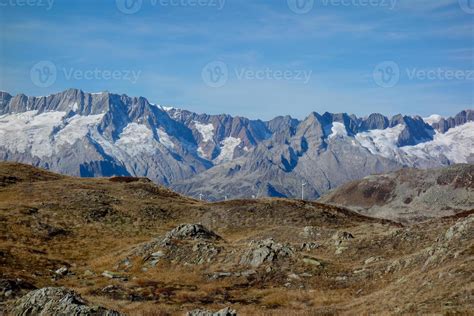 hiking in the swiss alps 10226258 Stock Photo at Vecteezy