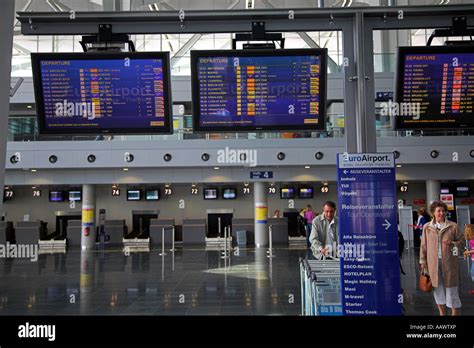 Arrival departure board at the EuroAirport Basel-Mulhouse-Freiburg in ...