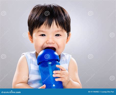 Little Boy Drinking with Water Bottle Stock Photo - Image of cute, background: 41196982