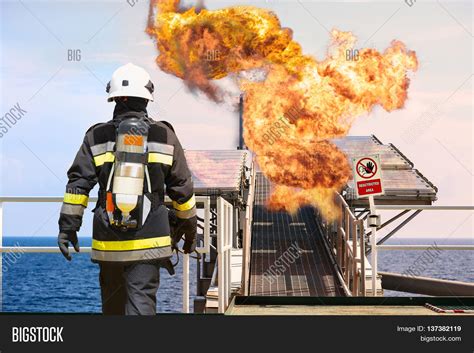 Fire Fighter On Oil Image & Photo (Free Trial) | Bigstock