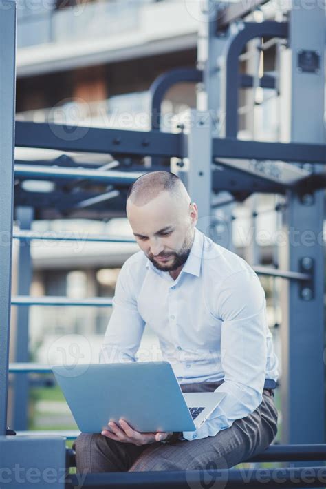 business man with laptop 6845115 Stock Photo at Vecteezy