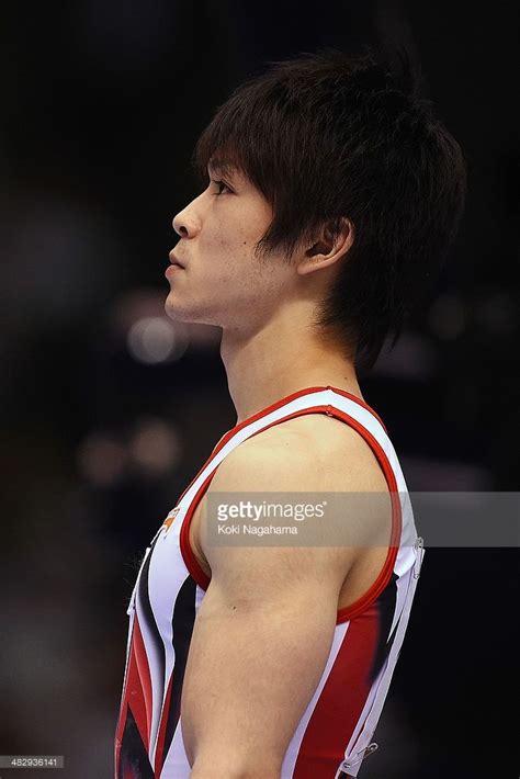 Kohei Uchimura of Japan competes inthe High Bar of Men's All Around ...