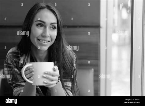 Portrait of young beautiful hipster woman at the coffee shop in black and white Stock Photo - Alamy