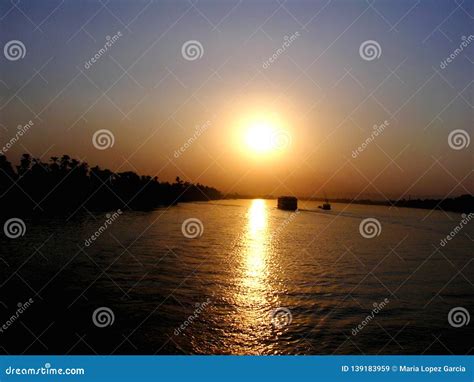 River Nile sunset, Egypt stock image. Image of tour - 139183959