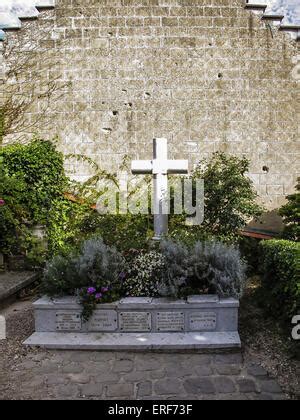 The family grave of impressionist artist Claude Monet in the small churchyard in Giverny in ...