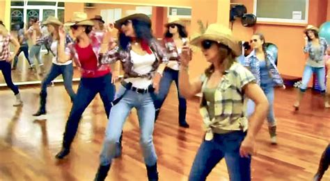 Cowgirls Kick Up Their Heels In Boot-Stompin' Brooks & Dunn Line Dance