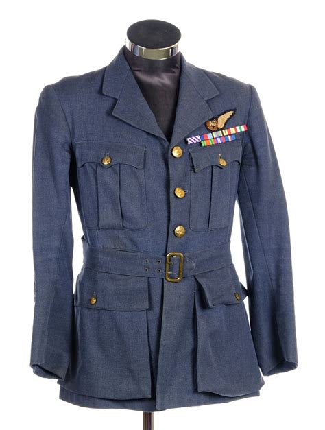 * RAF Uniform. A WWII RAF uniform worn by an Air Gunner, wit