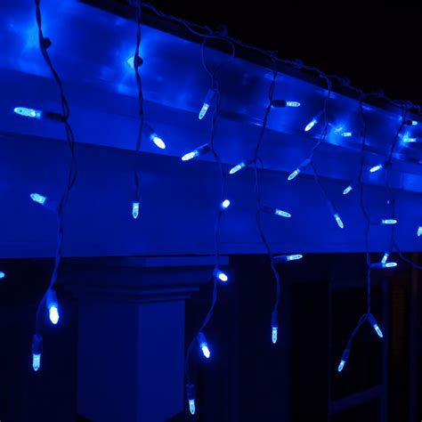 Set of 70 Blue Icicle Lights, LED Mini Ice Icicle Christmas Lights - White Wire, 7.5' - Walmart ...