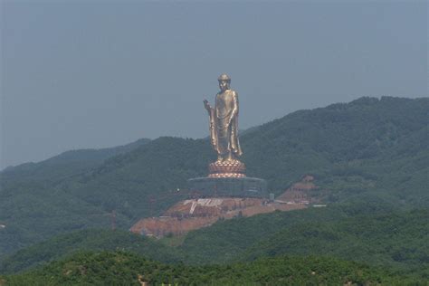 The Spring Temple Buddha, located in Zhaocun township, Lushan County, Hunan, China. The statue ...