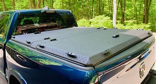 A Heavy Duty Truck Bed Cover On A Dodge Ram | A Rugged Black… | Flickr