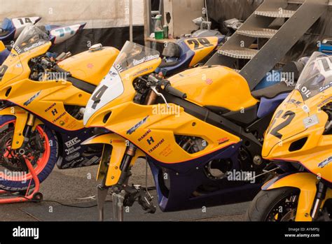 Powerbike and F600 Motorbikes in Paddock Garage at Oulton Park Motor Racing Circuit Cheshire ...