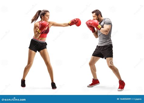 Young man and woman boxing stock image. Image of fist - 164050091